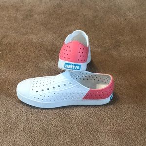 Pink and white Native shoes